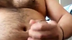 Chubby daddy bear jacking his uncut cock