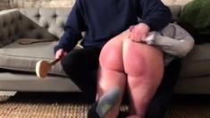 Spanking of Natasja's big ass with a laddle